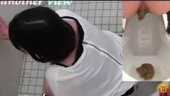 Pooping girl in japanese toilet